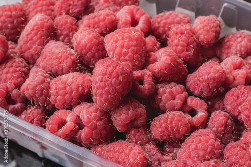 Raspberries are in the tray