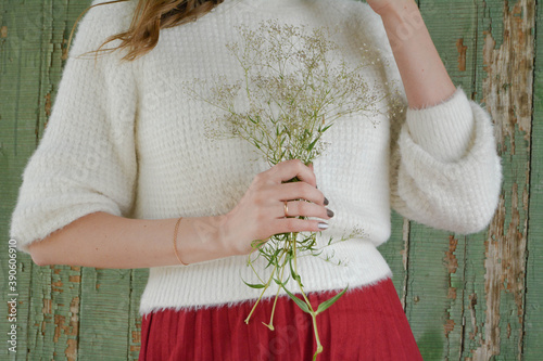 hands of a person with knitting