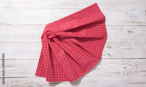 red table cloth on white wooden table