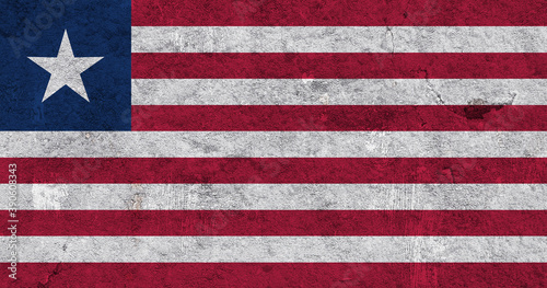 Fahne von Liberia auf verwittertem Beton