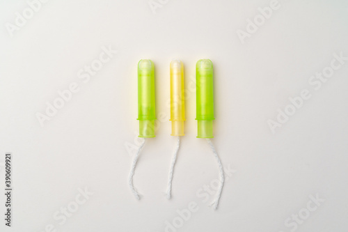 Heap of medical tampons on white background