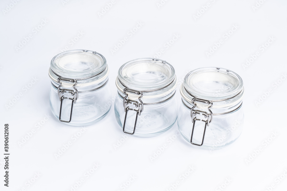 Three clear air tight Preserve Jar isolated on white background. Three clear air tight Preserve Jar isolated on white background.