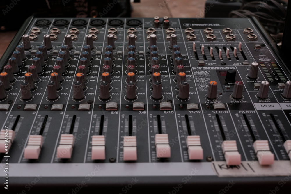 The mixing console lies on the table The mixing console lies on the table