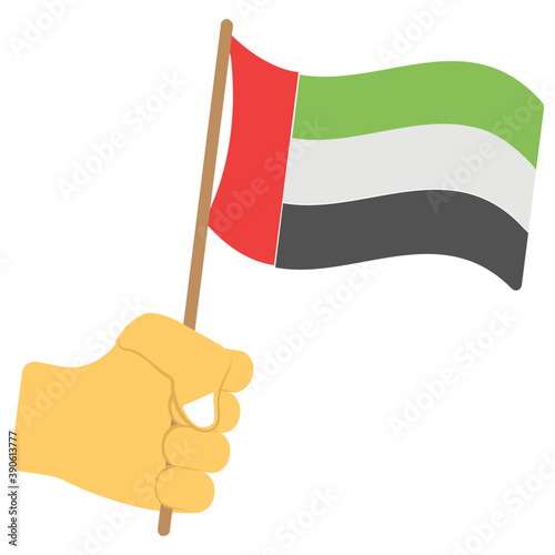 A hand swinging UAE flag is describing UAE independence day observance 