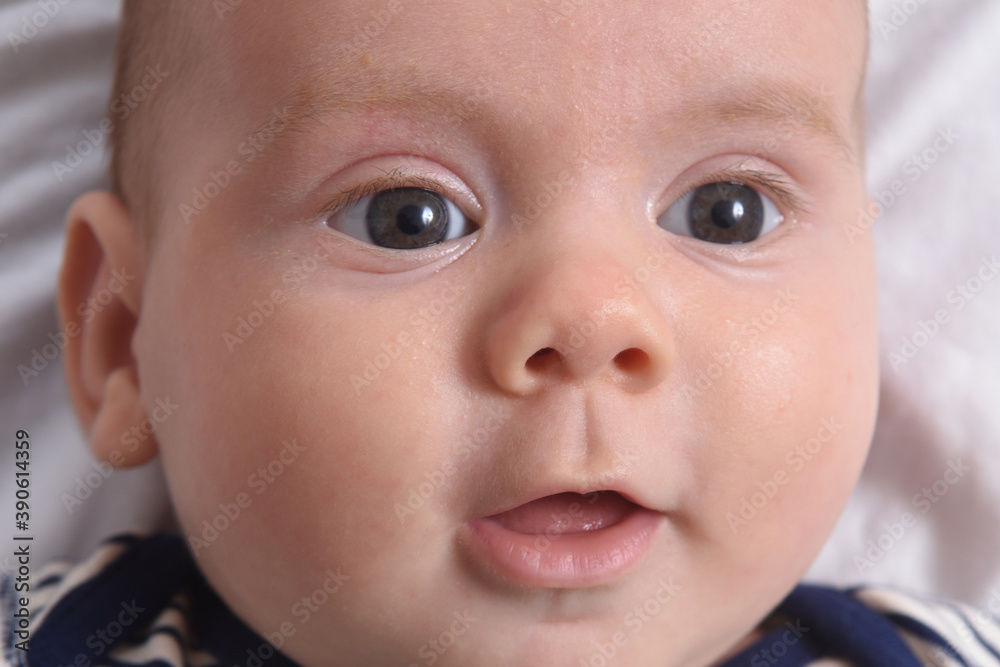 head shot of baby lying head shot of baby lying