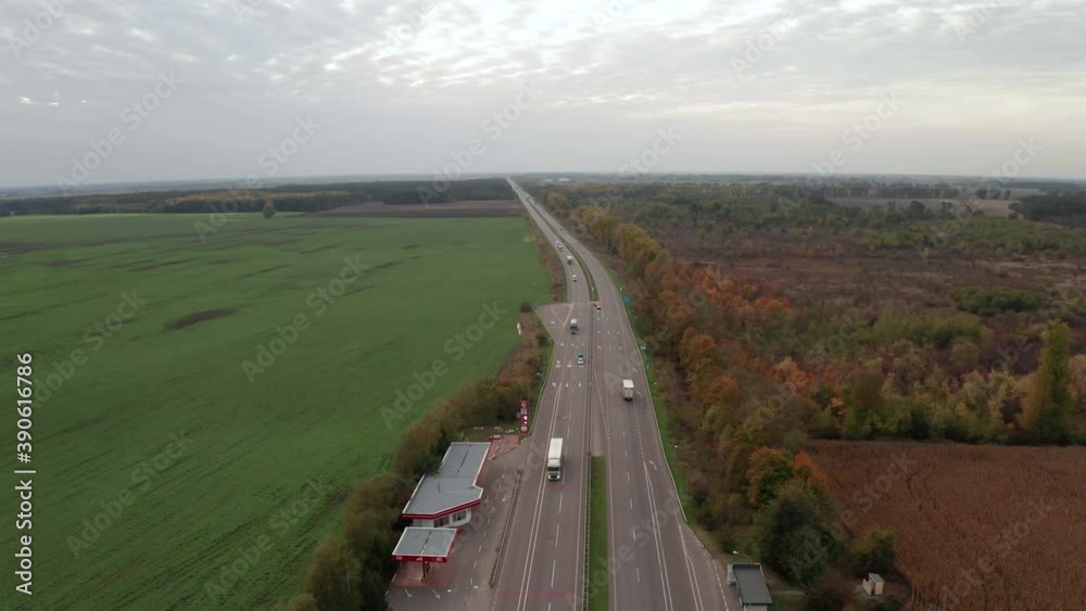 Aerial view of the highway in the countryside at sunset Aerial view of the highway in the countryside at sunset