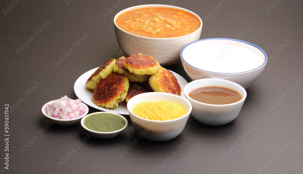 Ragda pattice -Aloo tikki or Potato Cutlet or Patties is a popular Indian street food made with boiled potatoes, spices and herbs served with tamrind chutney and peas curry. Ragda pattice -Aloo tikki or Potato Cutlet or Patties is a popular Indian street food made with boiled potatoes, spices and herbs served with tamrind chutney and peas curry.