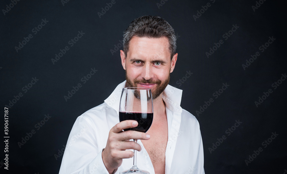 sexy man in unbuttoned shirt. guy drink red wine. cheers for happy valentines day. alcohol drinking. handsome male on romantic date. be my valentine. unshaven man with wine glass. sommelier sexy man in unbuttoned shirt. guy drink red wine. cheers for happy valentines day. alcohol drinking. handsome male on romantic date. be my valentine. unshaven man with wine glass. sommelier