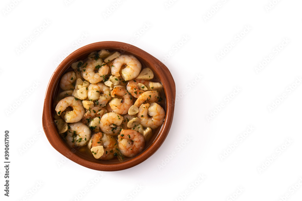Garlic prawns in crock pot isolated on white background . Top view. Copy space Garlic prawns in crock pot isolated on white background . Top view. Copy space