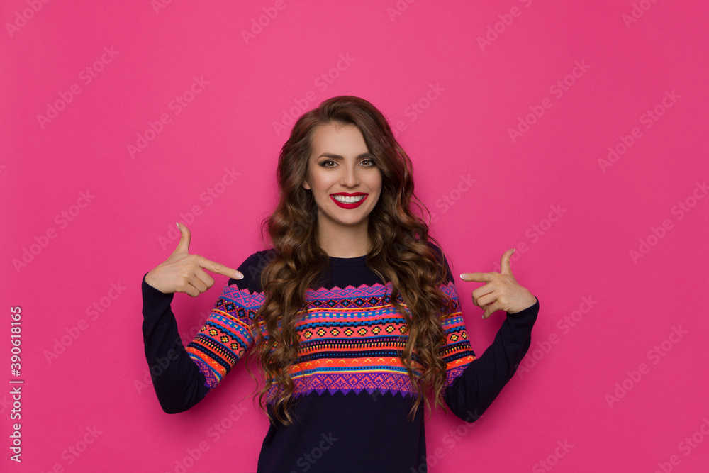 Confident Happy Woman In Sweater With Colorful Pattern Pointing At Herself