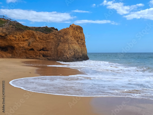 Red cliffs at a beautiful Algarve beach in Portugal