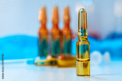 Plain ampule vials for injections close up photo