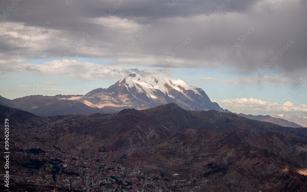 The city of la paz seen from above with mount illimani in the background - Bolivia