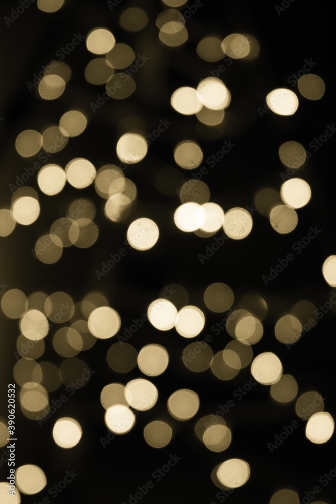 Abstract gold bokeh texture on black background Abstract gold bokeh texture on black background