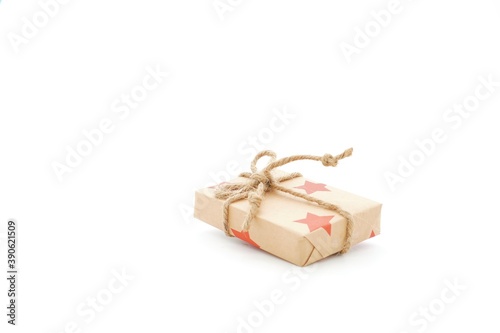 A brown gift box and a rope on a white background
