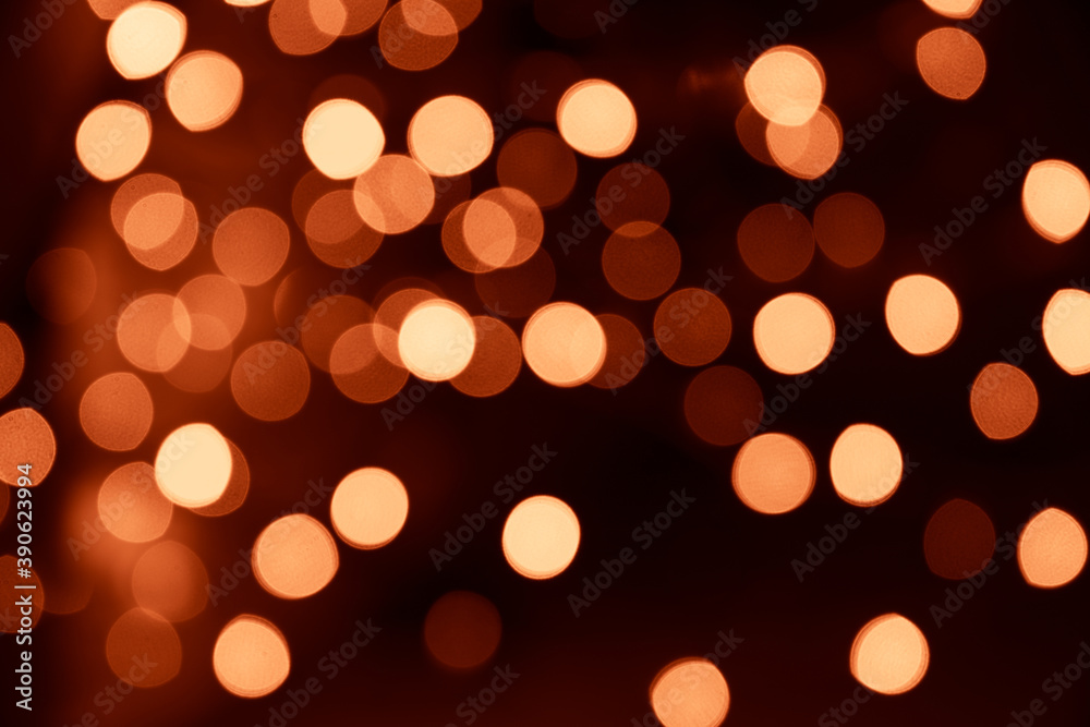 Abstract gold bokeh texture on black background