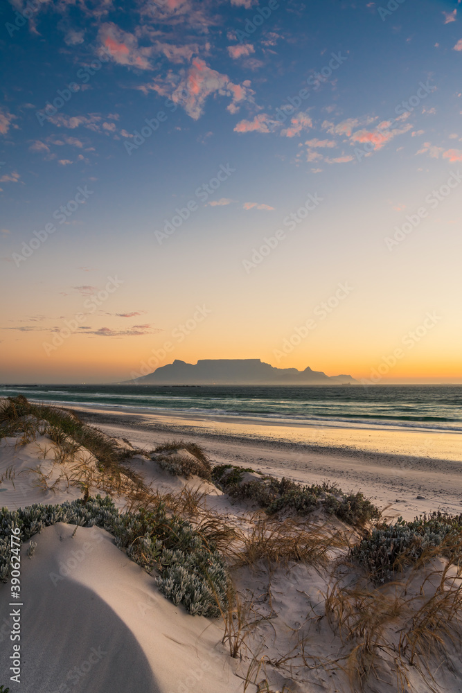 Obraz premium Table Mountain at Sunset from Big Bay, Cape Town, South Africa