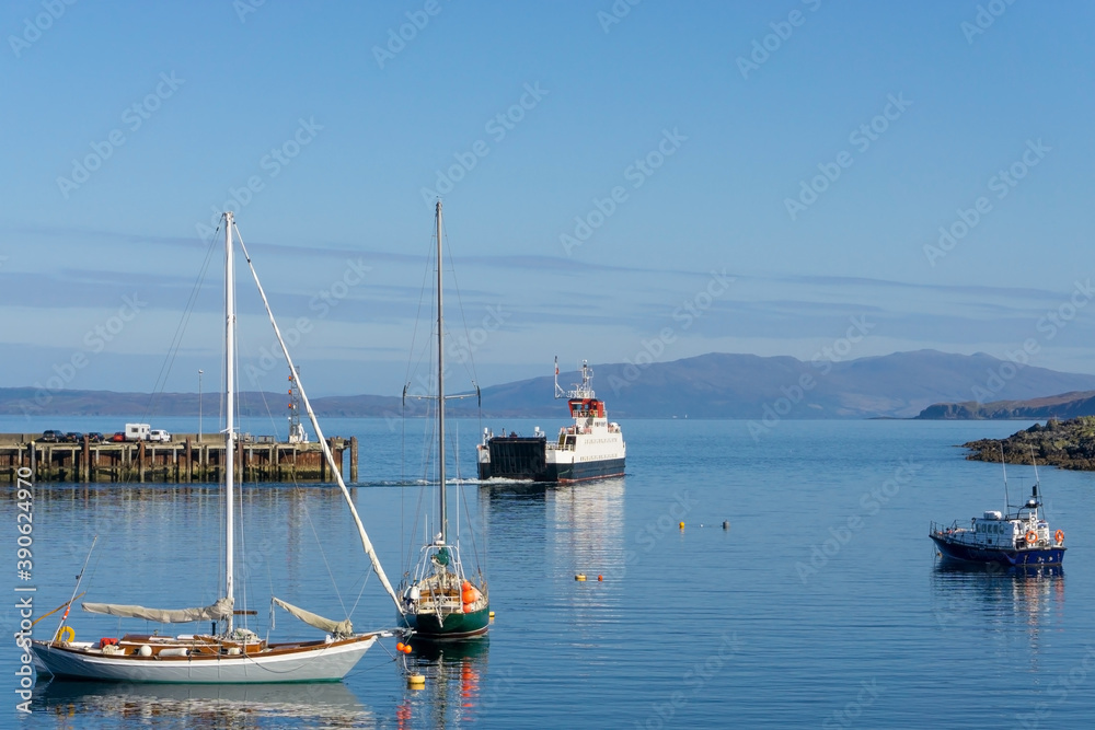 A ferry boat leaving the harbour of Mallaig in the Scottish highlands