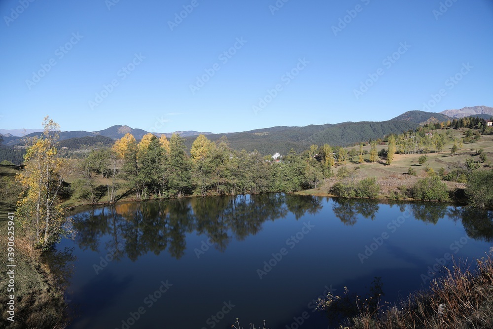 Beautiful colored trees with lake in autumn, landscape photography. Artvin/turkey