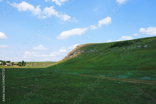 green meadow and hill
