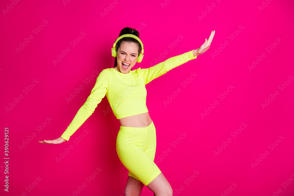 Portrait of her she nice attractive pretty cheerful cheery girl listening pop melody music enjoying dancing rest having fun isolated bright vivid shine vibrant pink fuchsia color background