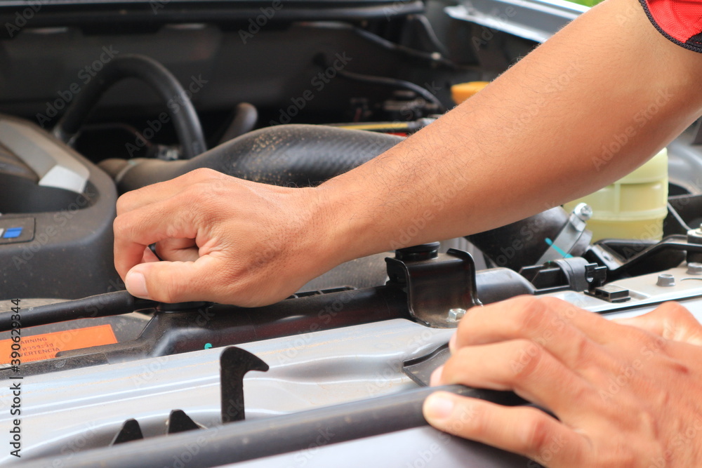 Man with checking car engine Car problems. Man with checking car engine Car problems.