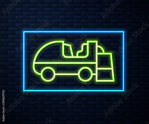 Glowing neon line Ice resurfacer icon isolated on brick wall background. Ice resurfacing machine on rink. Cleaner for ice rink and stadium. Vector.