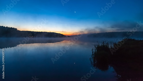 Mist over the lake dawn early morning in the summer © Александр Коликов
