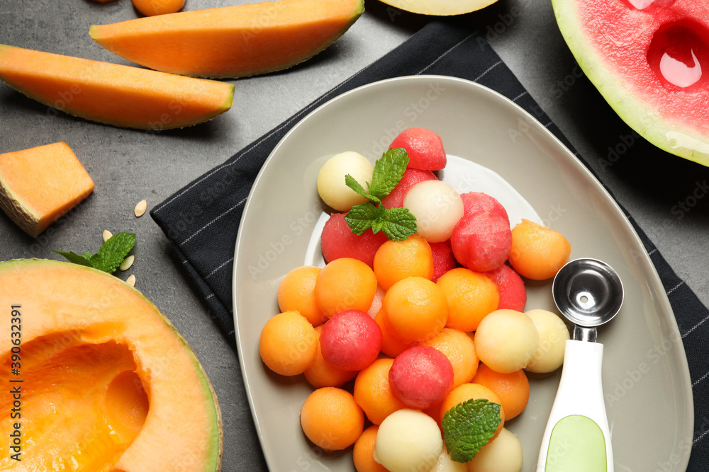 Flat lay composition with melon and watermelon balls on table Flat lay composition with melon and watermelon balls on table