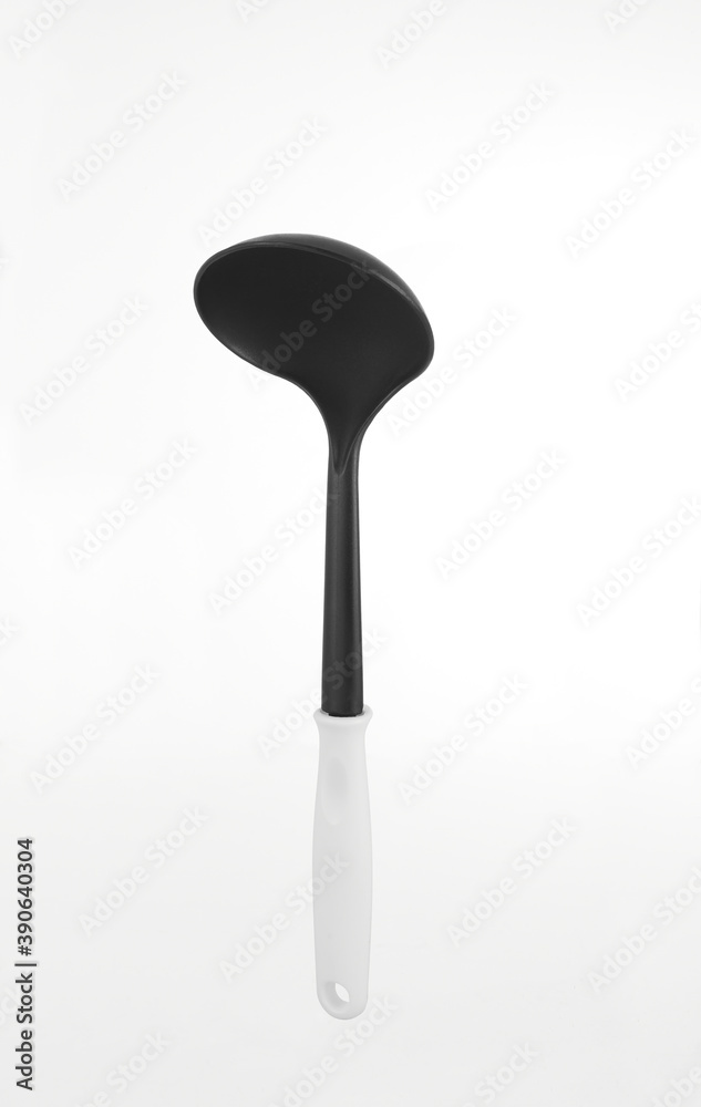 Plastic black kitchenware utensil isolated on white background. Plastic black kitchenware utensil isolated on white background.