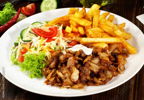 Tableau sur toile Gyros with French Fries on white Background