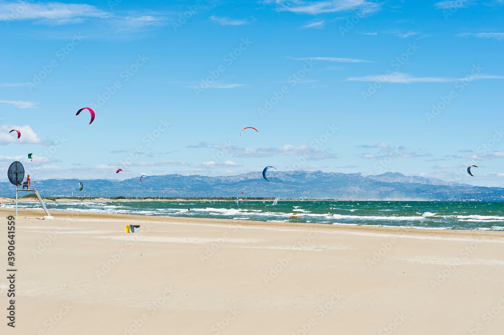 Kite surfing and windsurfing off Riumar beach, near Deltebre,  Parc Natural del Delta de l'Ebre, Castellón,  Eastern Spain
