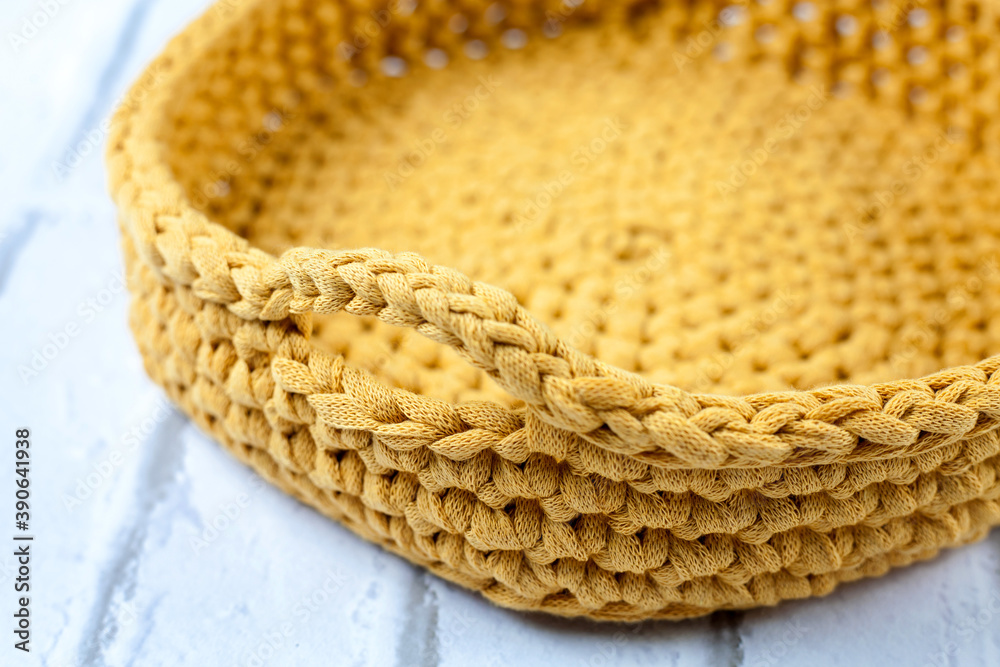 Crochet  basket made with yellow fabric