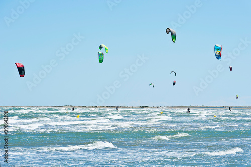 Kite surfing and windsurfing off Riumar beach, near Deltebre,  Parc Natural del Delta de l'Ebre, Castellón,  Eastern Spain