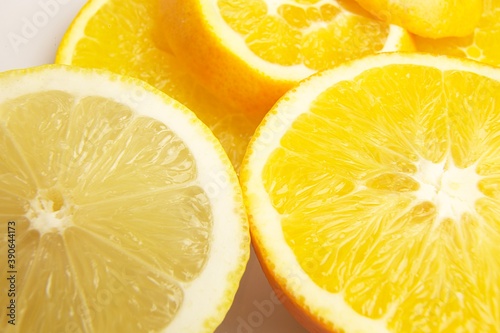 Fresh cut orange and lemon citrus fruit
