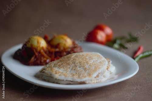 Rice pancake and egg roast, a traditional rice based breakfast dish of Kerala photo