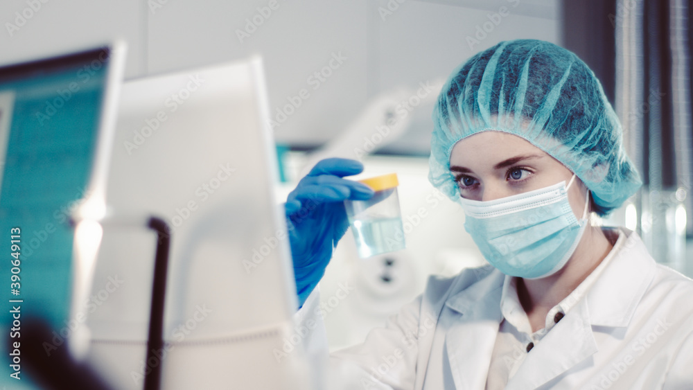 Female scientist testing biohazardous samples, Futuristic laboratory interior