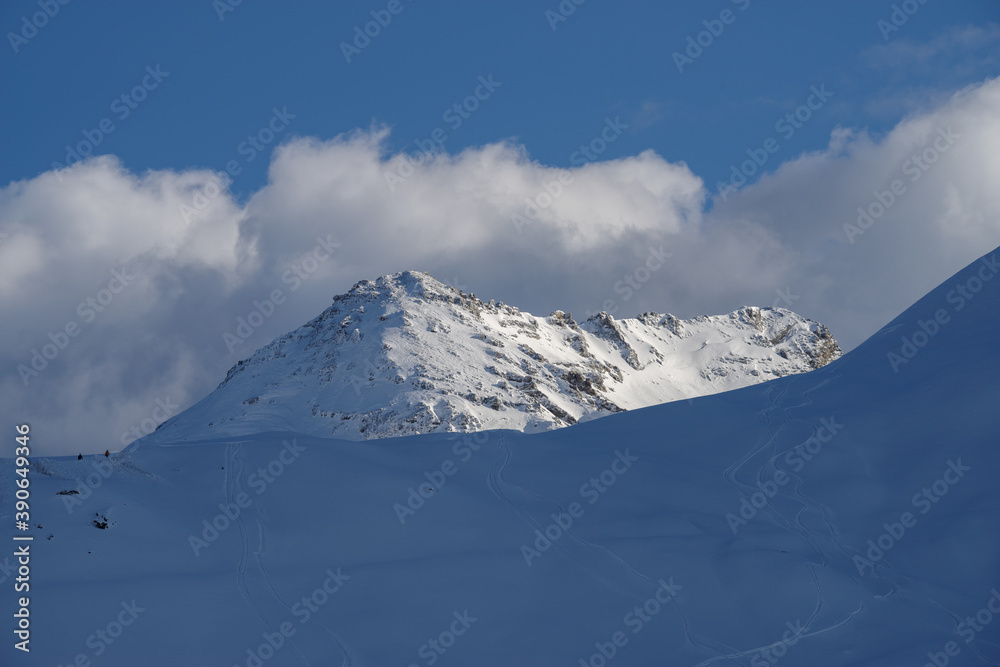 Snowcapped mountains against sky