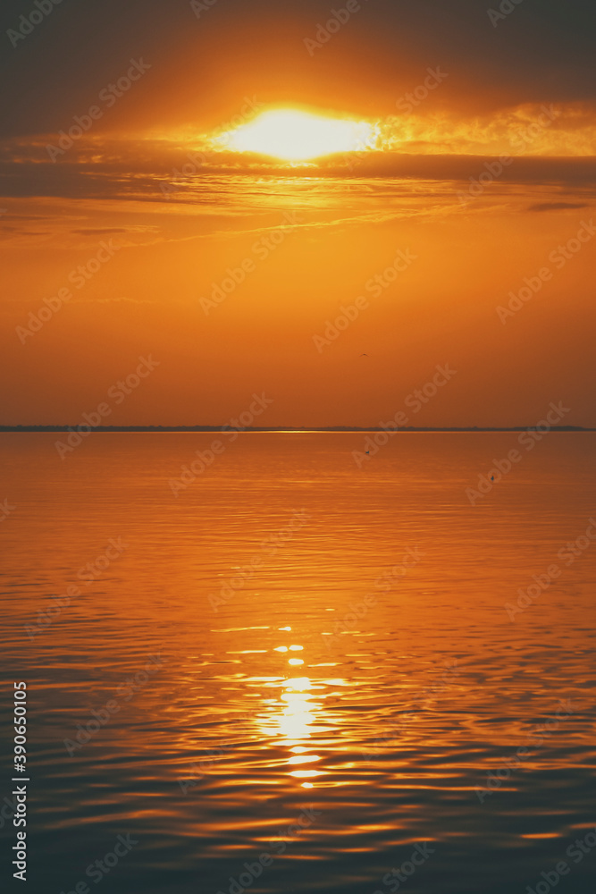 golden sunset over the calm sea