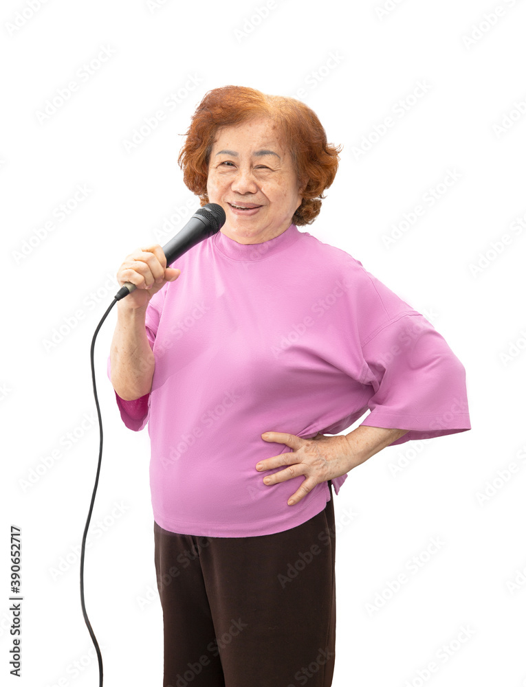 Grandma was happy to sing with a microphone. Isolated on white background