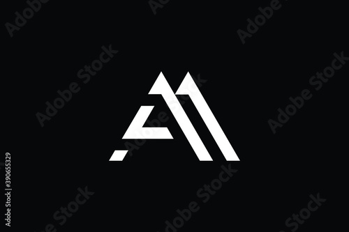AM logo letter design on luxury background. MA logo monogram initials letter concept. AM icon logo design. MA elegant and Professional letter icon design on black background. MA AM