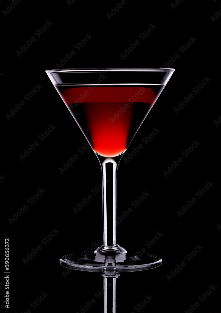 glass with red wine on a black background glass with red wine on a black background