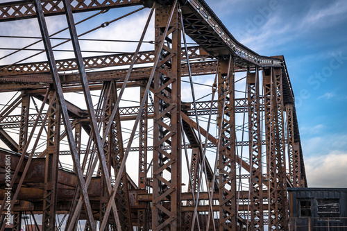 An old, rusty steel bridge