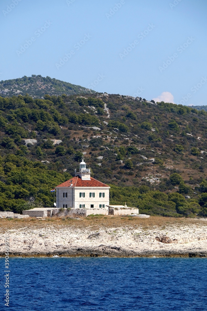 Picturesque lighthouse on the small island near Hvar, Croatia.