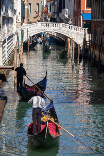 "Venice, Venice/Italy - 08/10/2016: Venice with famous Gondolas in some canal of the City"