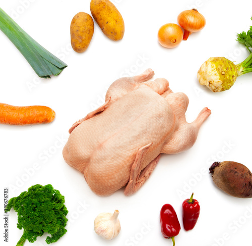 Weihanchtsente ungebraten und roh mit Gemüse