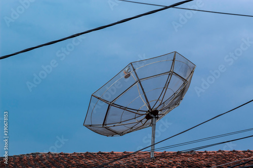Fototapeta Naklejka Na Ścianę i Meble -  TV antenna under cloudy sky