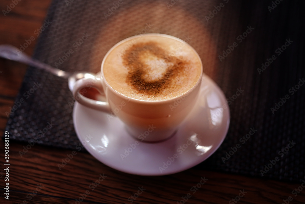 Photo of delicious coffee with a heart pattern cappuccino Photo of delicious coffee with a heart pattern cappuccino