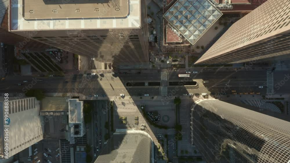 Above the rooftops of Downtown Los Angeles, California with Helicopter Pads, Wide Aerial Birds Eye View Overhead Top Down View Above the rooftops of Downtown Los Angeles, California with Helicopter Pads, Wide Aerial Birds Eye View Overhead Top Down View