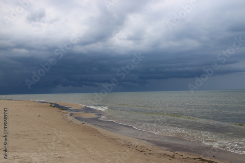 Empty beach on the Baltic Sea on a cloudy day. The impending storm © Adam